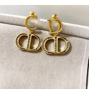 Di* Gold and Silver Designer Earrings